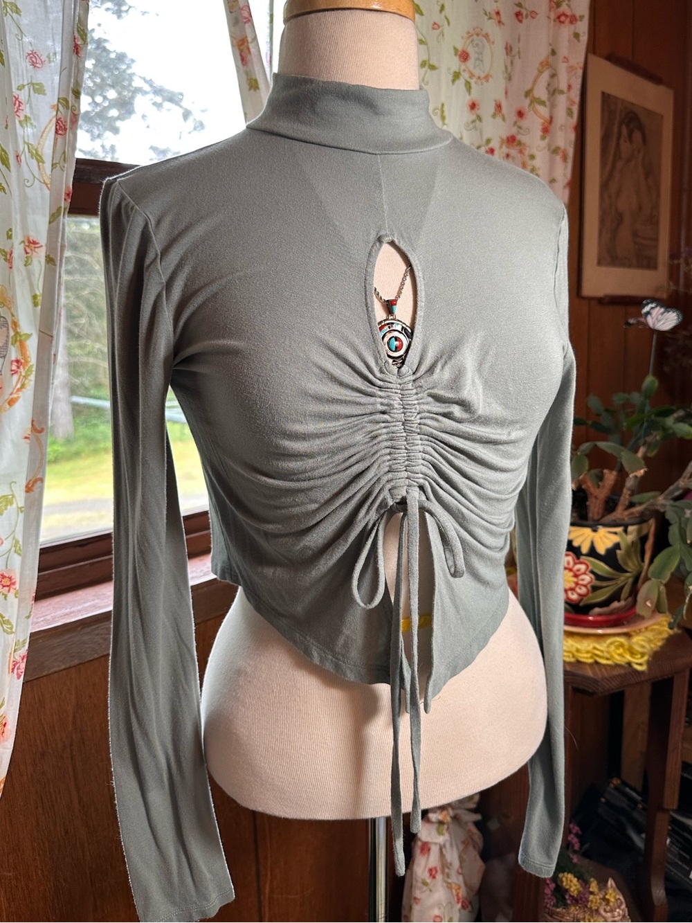 Pac Cares • Light Sage Green Hankerchief Hem Ruched Mock Neck Long Sleeve Top